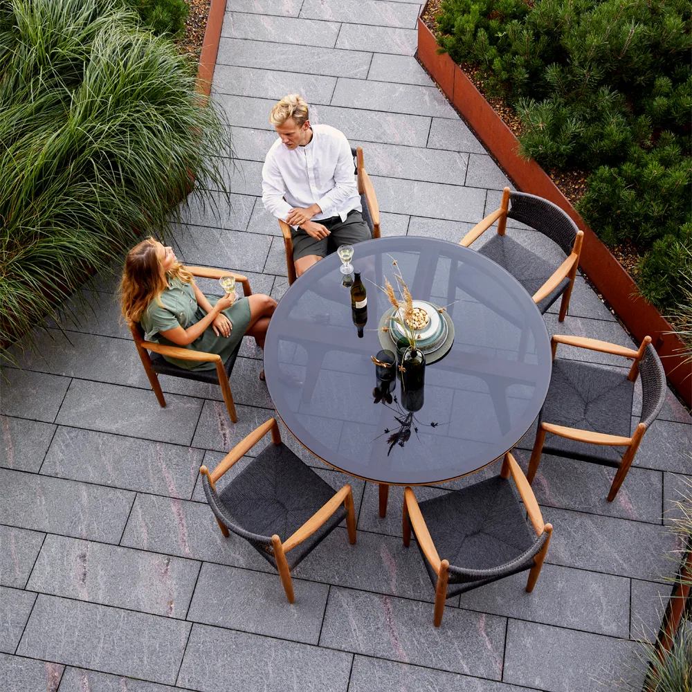 Aspect dining table round, Fossil black-teak Cane-line
