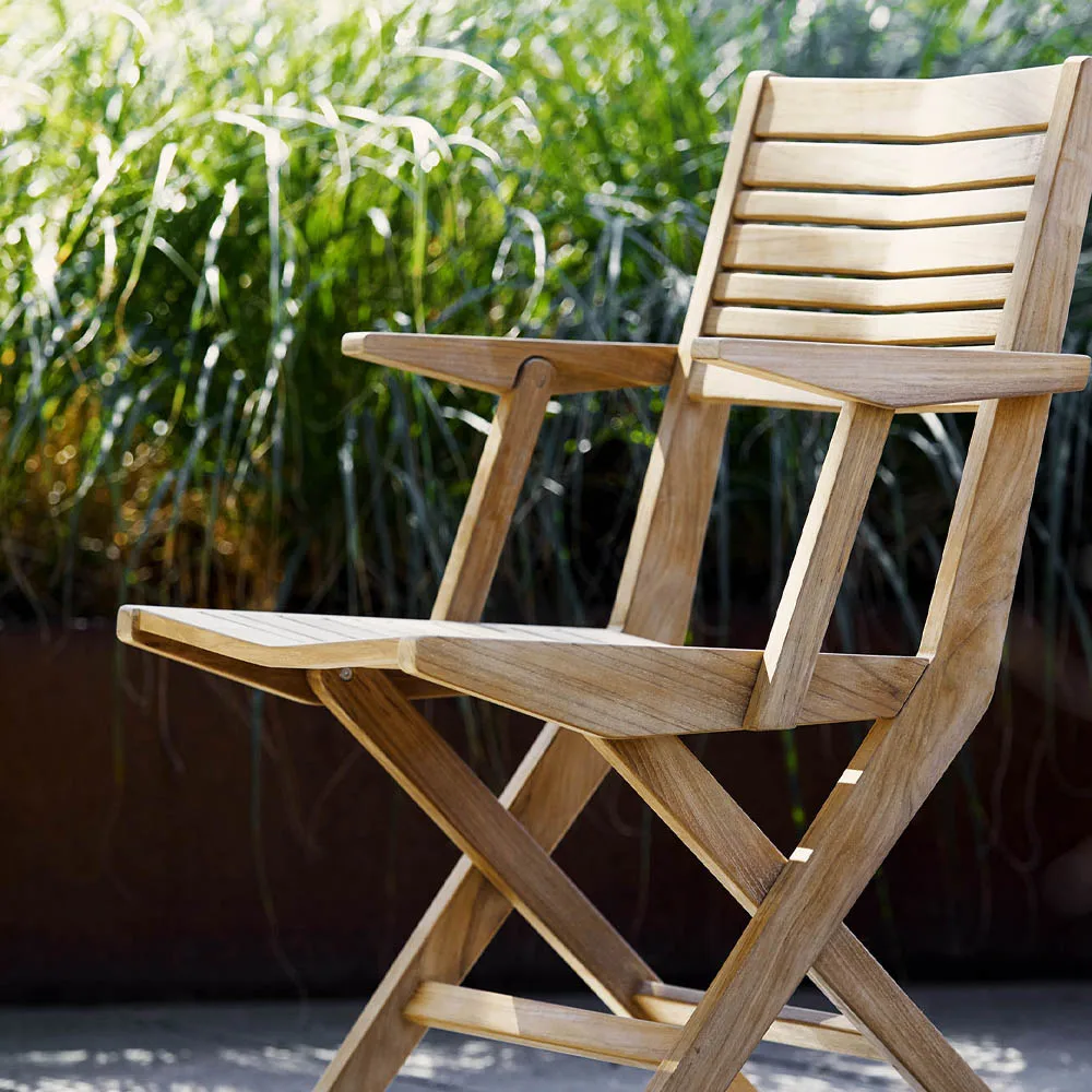 Flip folding chair, Teak, with armrests Cane-line
