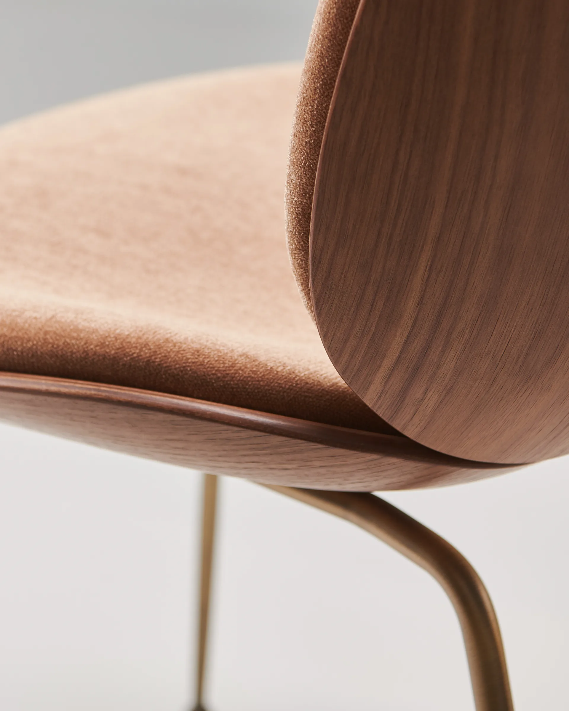 Beetle upholstered chair walnut, Antique brass-belsuede 132 GUBI