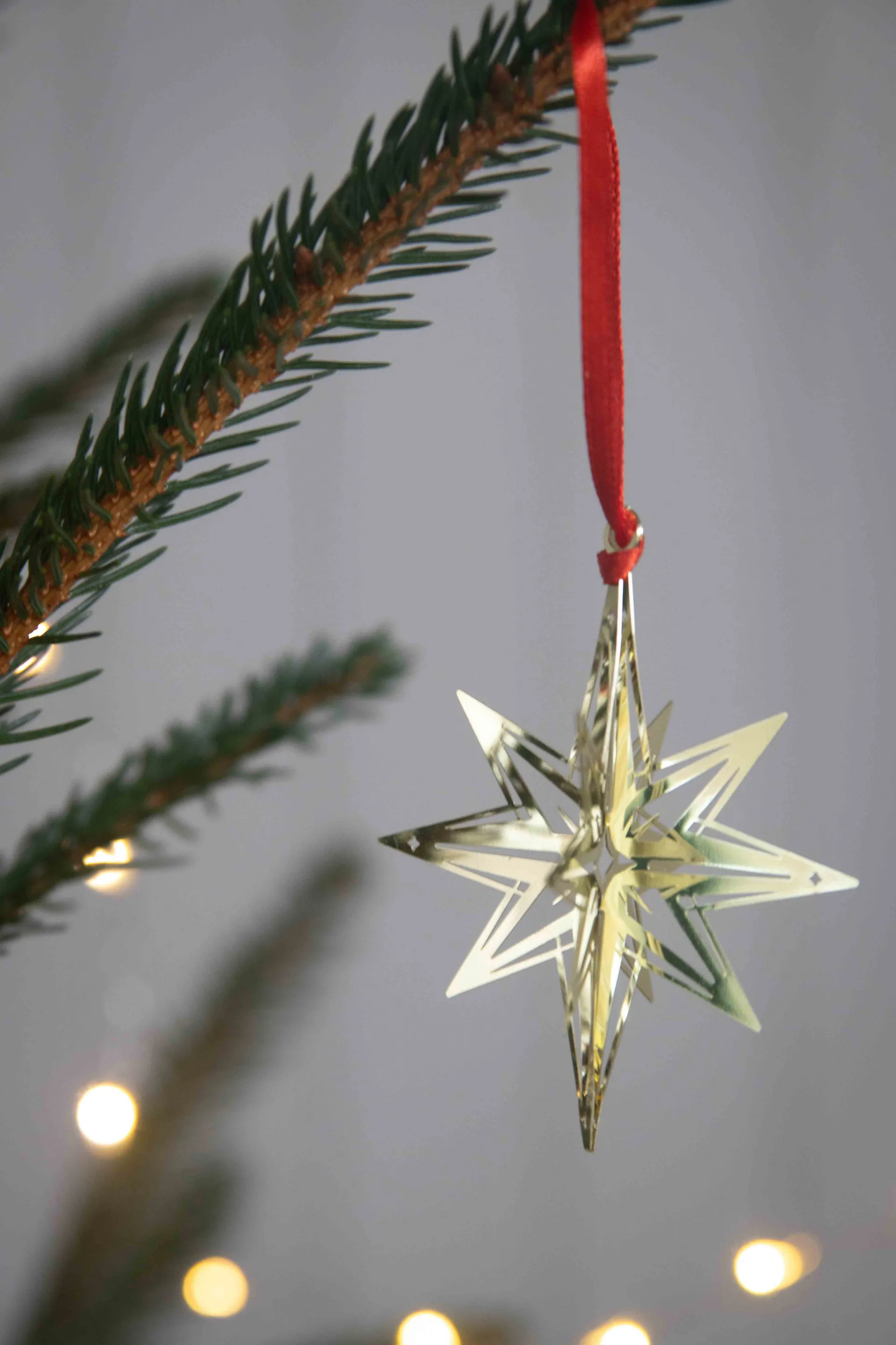 Northern star 3D Christmas hanging ornament, Gold Pluto Design