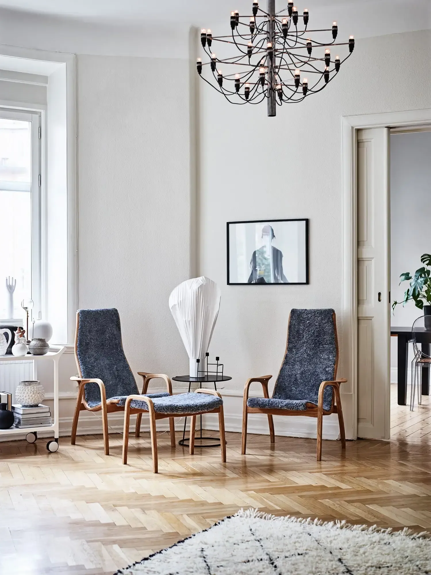Lamino armchair and footstool, Sheepskin Black-oiled oak Swedese