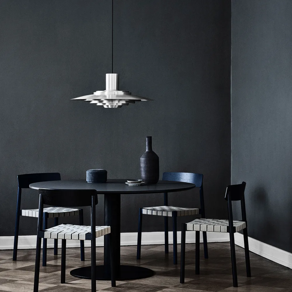 In Between SK12 dining table, Black lacquered oak. matte black metal stand &Tradition
